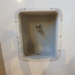 Haandvask til Kølemandens toiletvogn med pissoir.